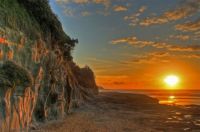 Sunset at Murawai Beach, NZ