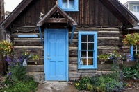 Cabin with blue door.