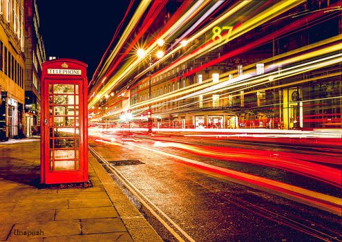 red telephone-booth at night