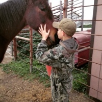 Young grandson with our broodmare