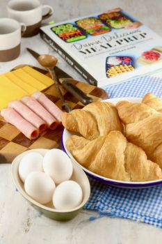 Eggs, croissants, ham and cheese for breakfast sandwiches