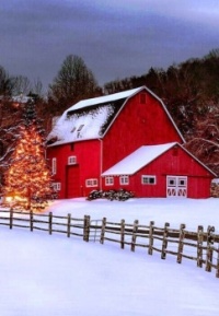 Red Barn With A Fence In Winter