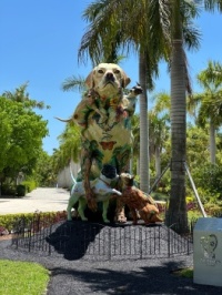 Downtown Miami Florida art exhibit. A beautiful walk among the painted statues of dogs and cats.