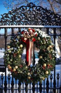 Christmas wreath on an iron fence