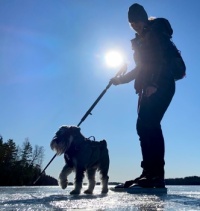 Ice skating on lake in Sweden with “mini-wolf”