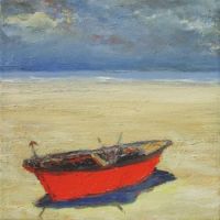 Red boat on the sea shore