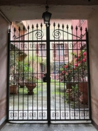 Gate to a courtyard in Chieri (TO), Italy