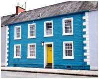 Terraced Blue & White House with a Bright Yellow Street Door