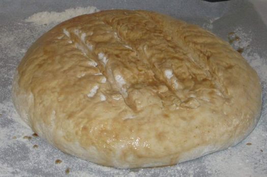 Round loaf of bread prior to baking