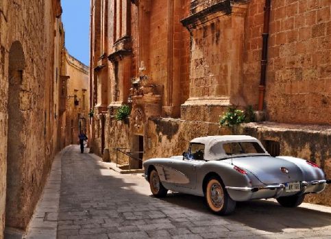 Vintage Corvette on a street in Mdina, Malta