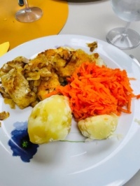 Fried fish, potatoes and carrots