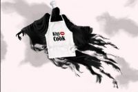 dementor cook wearing kiss the cook apron