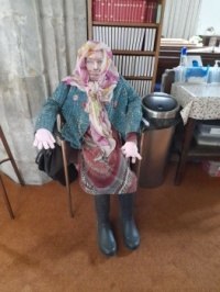 Terrifying Queen scarecrow in my old church.