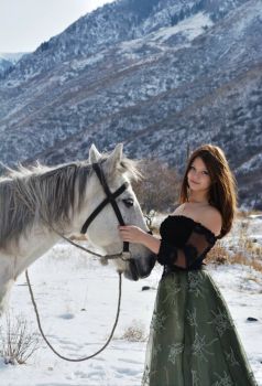 Pretty girl with a horse