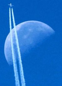 Passenger Plane Flies Past the Moon Germany