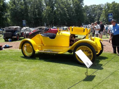 Yellow race car from the 1915 era