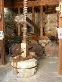 Wooden wine press.