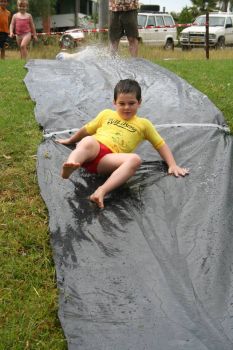 Grandson on water slide