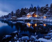 Winter lake cabin