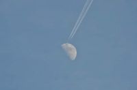 Moon Behind Plane