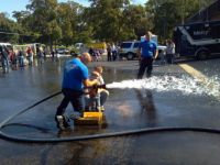 Blayne  using the fire hose