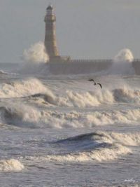 Lighthouse in brewing storm