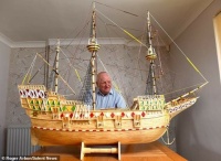 David Reynolds poses with his detailed Mayflower replica