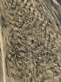 Patterns:  Beach sand and water