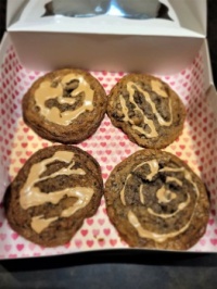 Greyson's hoomin:  Freshly baked Cafe Coffee Cookies with coffee glaze and chocolate chunks