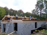 The Amish, and family, building sister-in-laws new house.