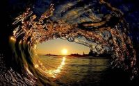 sunset through a wave