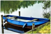 Blue Rowboat at Dock