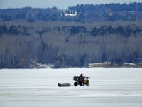 Out on Lake Superior with his auger