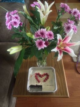 Yummy birthday cake and flowers