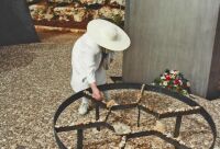 B 122 Kay adding a stone commemorating the Holocaust dead at Yad Vashem, 1994 Israel trip