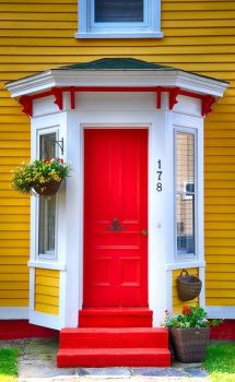 Amazing yellow house with red door
