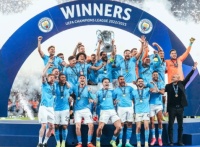 Man City treble winners