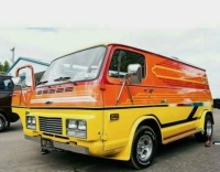 Impressive early Chevy Van with custom Lights and Grill_068