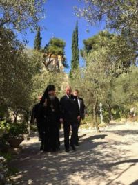 Off topic - Prince Charles walking in the gardens of Jerusalem's Church of Saint Mary Magdalene on...