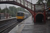 144016 at a very damp Garforth station 27-7-19