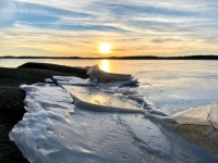 Breaking ice in the sunset