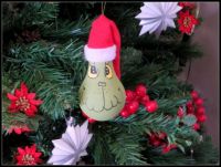 Grinch ornament made of old lightbulbs