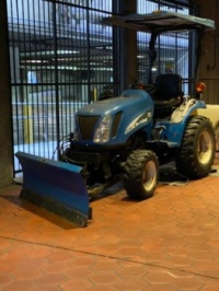 Blue snow plow