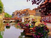 Places you would rather be right now.........in a boat in Colmar, France.